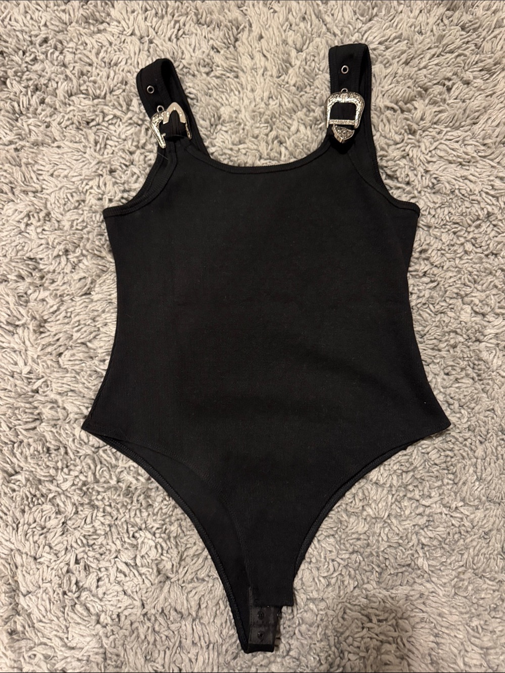 Black One-Piece Bodysuit with Decorative Buckles